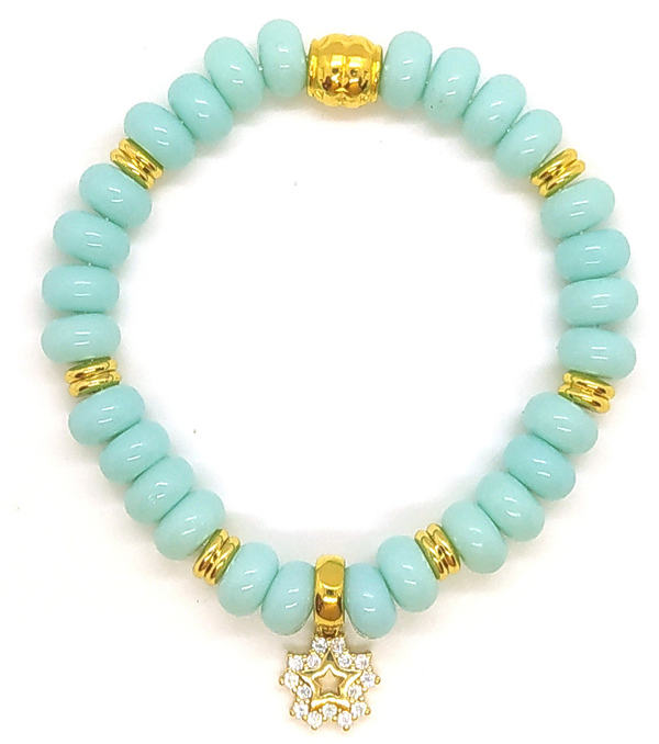 Bracelet élastique en perles en verre Heishi bleue.